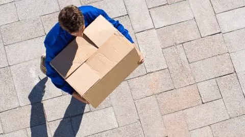 Booking a Cardboard Box as Checked Luggage – You Need to Know This!