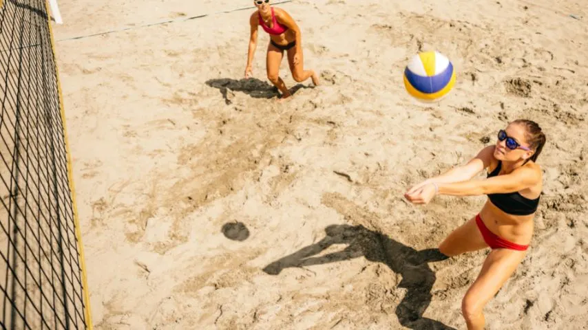 Sandbar Cantina serves beach vibes in the heart of the city and provides opportunities to enjoy sports like sand volleyball.