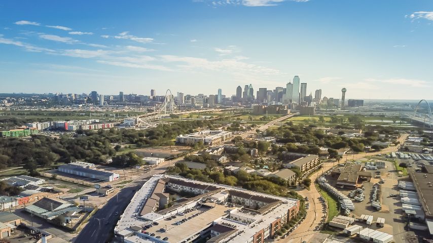 The skyline of Downtown Dallas can be seen from Trinity Groves.