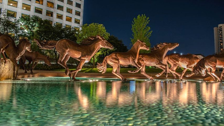 When you live in Irving, you'll be able to see the realistic-looking Mustangs of Las Colinas.